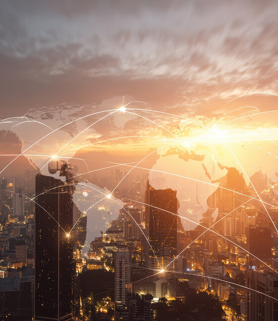 Global network connectivity over modern city skyline at sunset
